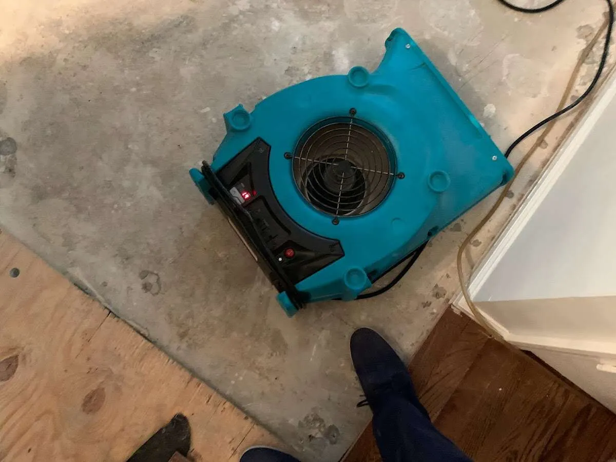 Air mover drying subfloor during Leak Detection & Repair in Tempe